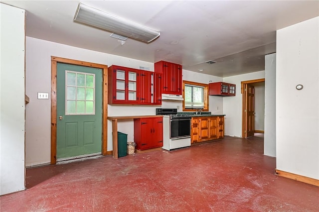 117 Oak Dr, Forward Twp But, PA 16033 - kitchen with white range oven, under cabinet range hood, and glass insert cabinets