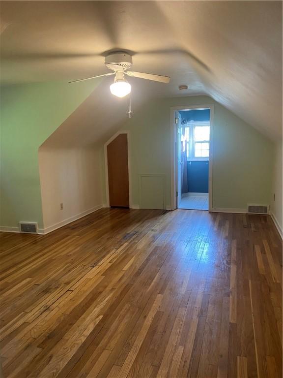 175 Crescent Hills Rd, Penn Hills, PA 15235 - additional living space featuring dark wood finished floors, a ceiling fan, and lofted ceiling