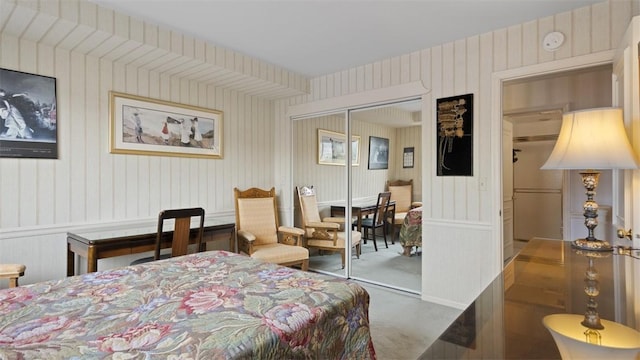 220 N Dithridge St Unit 1001, Oakland, PA 15213 - carpeted bedroom with wallpapered walls and a closet