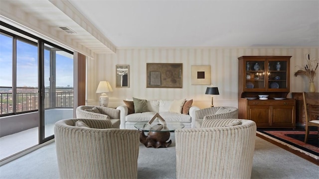 220 N Dithridge St Unit 1001, Oakland, PA 15213 - living room with carpet floors, wallpapered walls, and ornamental molding