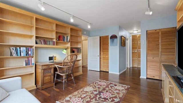 220 N Dithridge St Unit 1001, Oakland, PA 15213 - home office featuring rail lighting, built in study area, and dark wood-type flooring