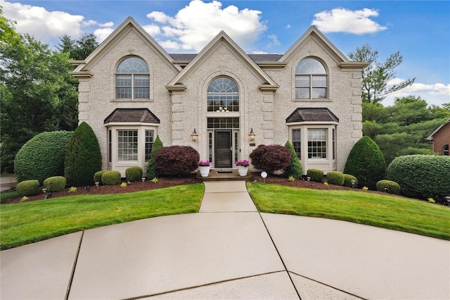 1500 Zenith Ct, Upper St Clair, PA 15241 - view of front of home with brick siding and a front lawn