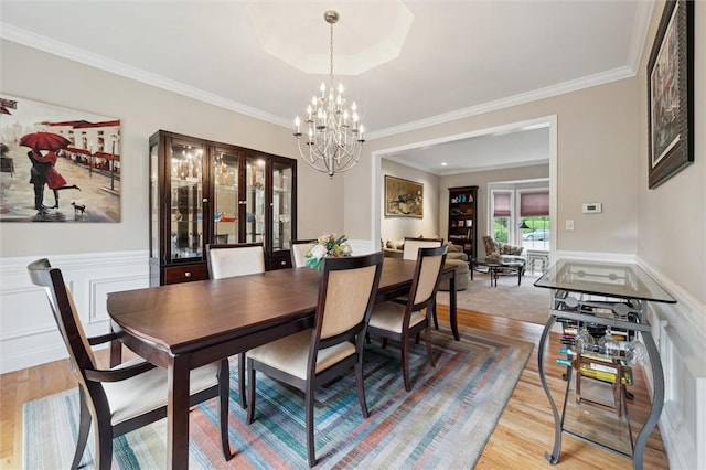 1500 Zenith Ct, Upper St Clair, PA 15241 - dining room with a chandelier, crown molding, light wood-style floors, and wainscoting