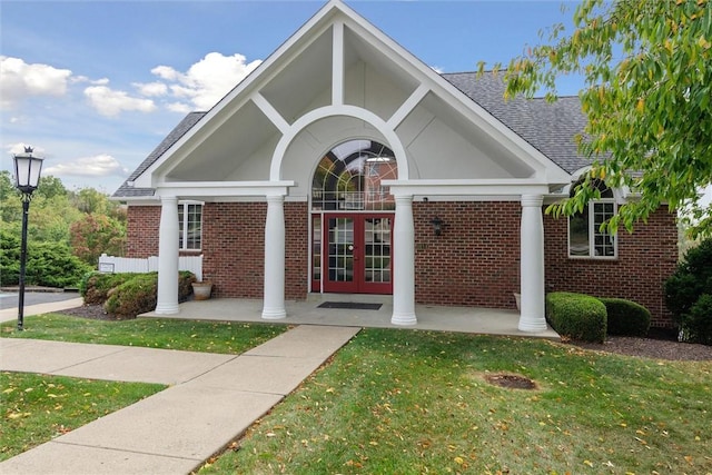 1500 Zenith Ct, Upper St Clair, PA 15241 - view of front of home with french doors, brick siding, a front lawn, and a shingled roof