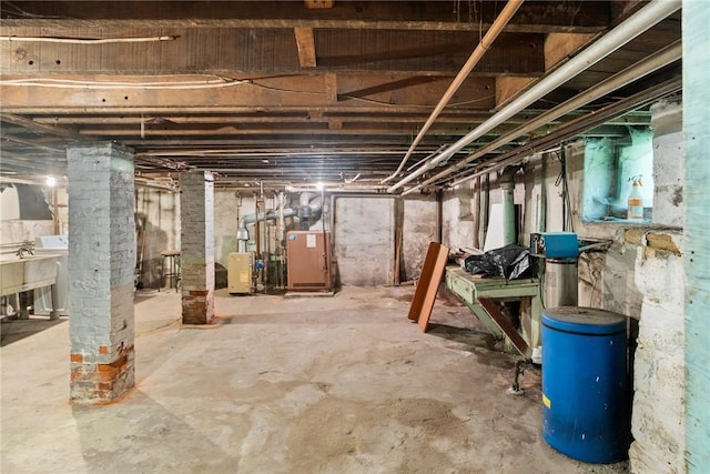 97 N Euclid Ave, Bellevue, PA 15202 - unfinished basement featuring a heating unit and washer / clothes dryer