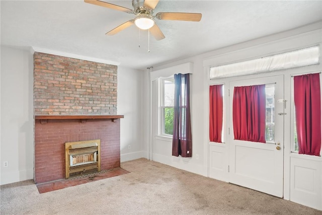 97 N Euclid Ave, Bellevue, PA 15202 - unfurnished living room with carpet flooring, ceiling fan, and a brick fireplace