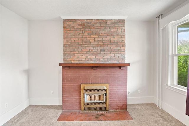 97 N Euclid Ave, Bellevue, PA 15202 - detailed view of a brick fireplace, heating unit, and carpet