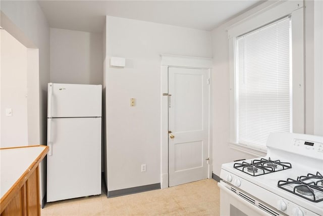 97 N Euclid Ave, Bellevue, PA 15202 - kitchen with white appliances, brown cabinets, and light countertops