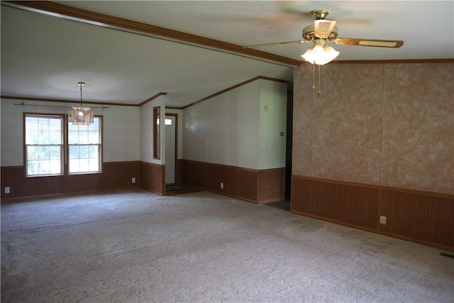 115 Pike Ave, North Beaver Twp, PA 16102 - carpeted spare room with wainscoting, a chandelier, ceiling fan, ornamental molding, and lofted ceiling
