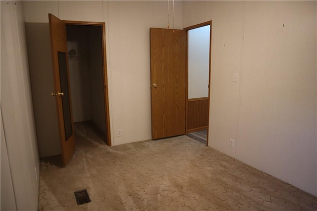 115 Pike Ave, North Beaver Twp, PA 16102 - unfurnished bedroom with carpet, a walk in closet, and a closet