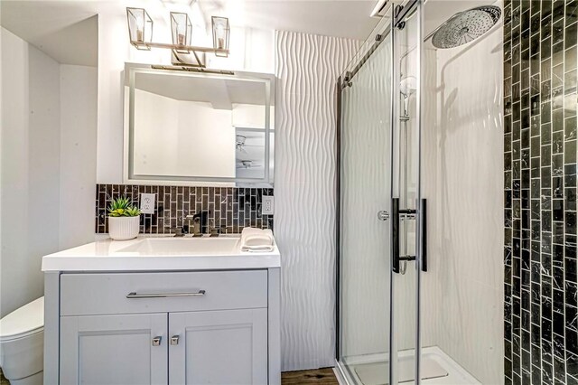 150 Dover Dr, Moon/Crescent Twp, PA 15108 - bathroom with a shower stall, vanity, and backsplash