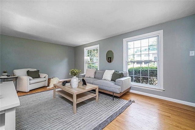 150 Dover Dr, Moon/Crescent Twp, PA 15108 - living room with light wood finished floors and baseboards