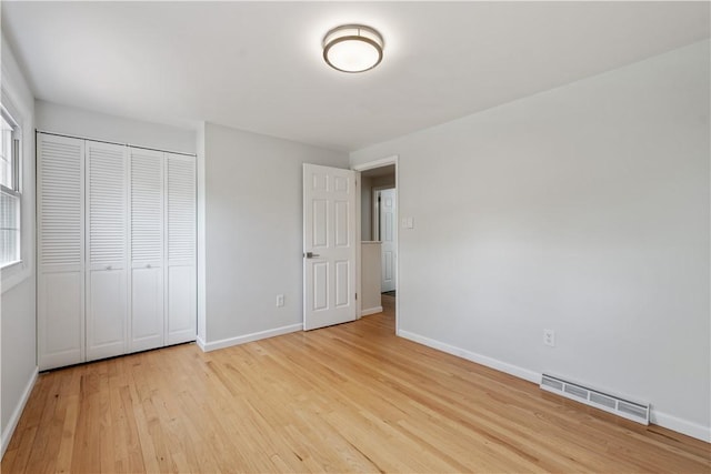 150 Dover Dr, Moon/Crescent Twp, PA 15108 - unfurnished bedroom featuring light wood finished floors and a closet