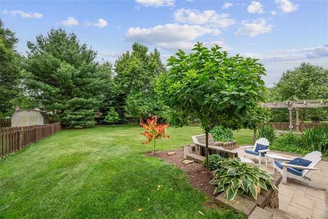 105 Averys Way, Cranberry Twp, PA 16066 - fenced yard featuring a patio area and a storage unit
