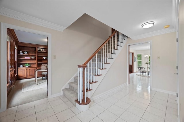 105 Averys Way, Cranberry Twp, PA 16066 - stairs with tile patterned flooring, ornamental molding, and a chandelier