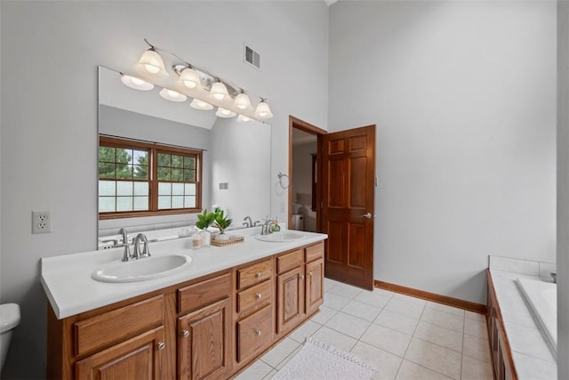 105 Averys Way, Cranberry Twp, PA 16066 - full bath featuring double vanity, tiled tub, tile patterned flooring, and a high ceiling