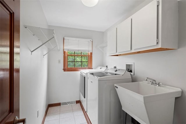 105 Averys Way, Cranberry Twp, PA 16066 - washroom featuring cabinet space, independent washer and dryer, and light tile patterned floors