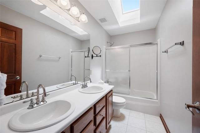 105 Averys Way, Cranberry Twp, PA 16066 - full bathroom featuring a skylight, double vanity, tile patterned floors, and combined bath / shower with glass door