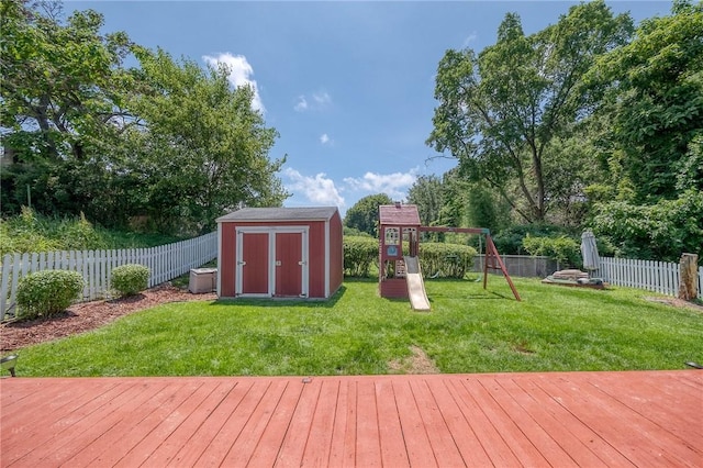 628 Illini, Monroeville, PA 15146 - deck with a storage shed, a playground, a fenced backyard, and view of scattered trees