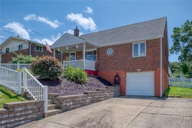 628 Illini, Monroeville, PA 15146 - view of front of property featuring a garage, brick siding, covered porch, a chimney, and driveway