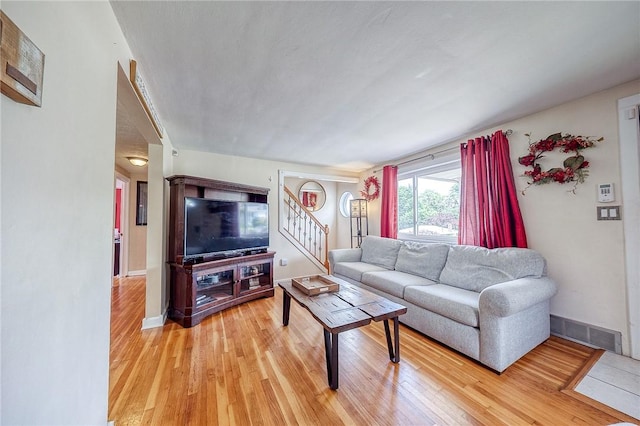 628 Illini, Monroeville, PA 15146 - living room with light wood-style floors and stairway