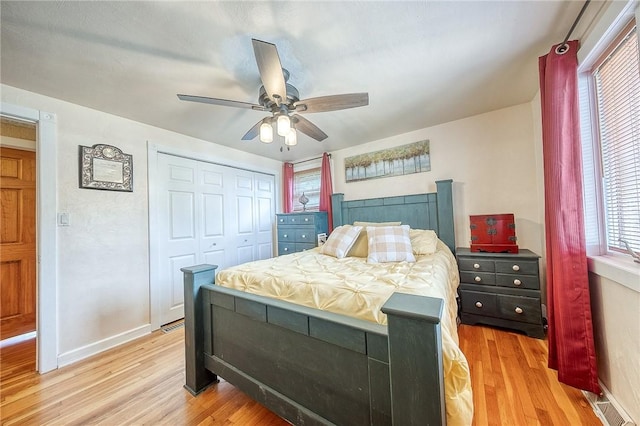 628 Illini, Monroeville, PA 15146 - bedroom with light wood-style flooring, a closet, and a ceiling fan