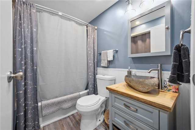 301 Holland Ct, Findlay Twp, PA 15108 - bathroom with shower / bath combination with curtain, vanity, wood finished floors, and wainscoting
