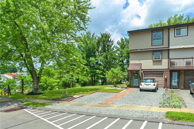 301 Holland Ct, Findlay Twp, PA 15108 - view of front facade with an attached garage, a front lawn, and brick siding
