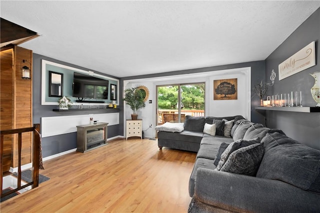 301 Holland Ct, Findlay Twp, PA 15108 - living area featuring wood finished floors and a fireplace