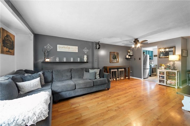 301 Holland Ct, Findlay Twp, PA 15108 - living room with light wood finished floors and ceiling fan