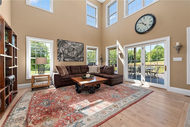 548 Lang Rd, Sewickley Heights, PA 15143 - living area with a towering ceiling and hardwood / wood-style flooring