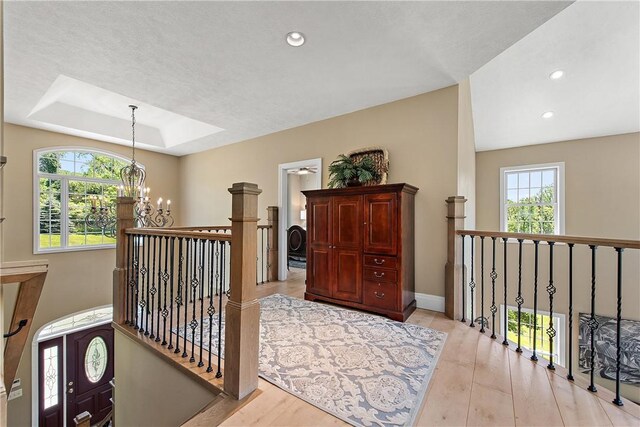 548 Lang Rd, Sewickley Heights, PA 15143 - hallway with a chandelier, an upstairs landing, recessed lighting, and light wood-type flooring