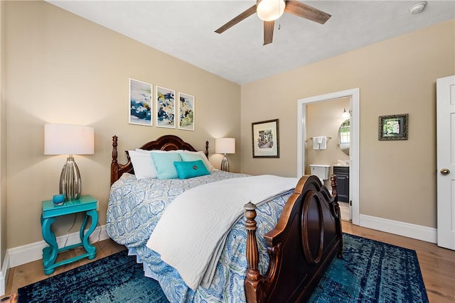 548 Lang Rd, Sewickley Heights, PA 15143 - bedroom with wood finished floors, a ceiling fan, and ensuite bathroom