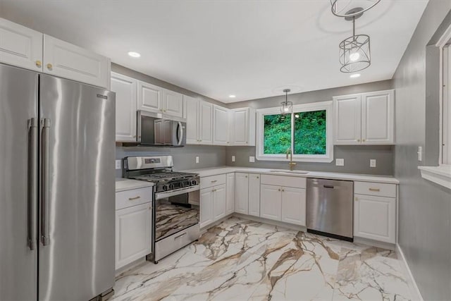 5241 Gardenville, Bethel Park, PA 15236 - kitchen featuring appliances with stainless steel finishes, light countertops, light marble finish flooring, recessed lighting, and white cabinets
