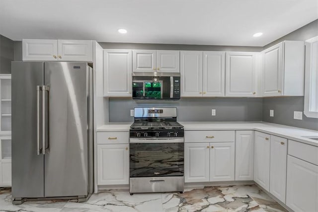 5241 Gardenville, Bethel Park, PA 15236 - kitchen featuring stainless steel appliances, light marble finish flooring, light countertops, white cabinetry, and recessed lighting