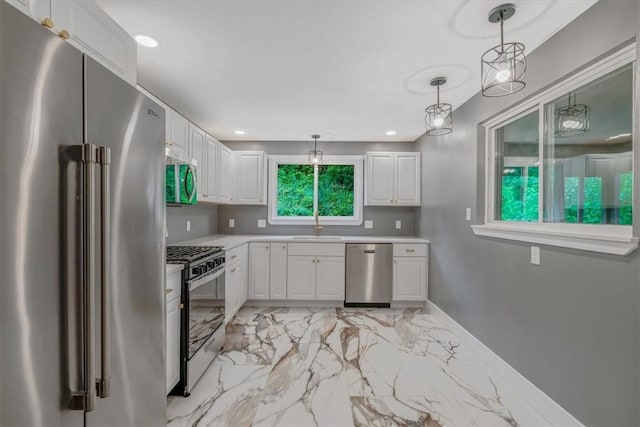5241 Gardenville, Bethel Park, PA 15236 - kitchen with appliances with stainless steel finishes, light marble finish flooring, light countertops, white cabinetry, and recessed lighting