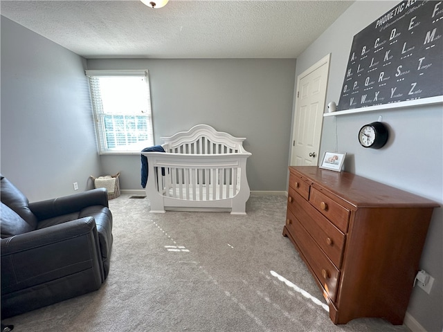 178 Foxchase Dr, North Strabane, PA 15317 - carpeted bedroom with a textured ceiling and a crib