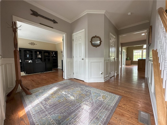 178 Foxchase Dr, North Strabane, PA 15317 - corridor with wood finished floors, a wainscoted wall, ornamental molding, and a decorative wall