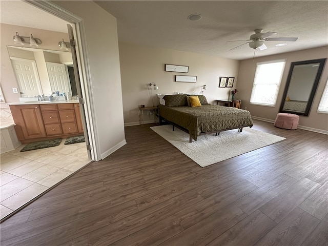 178 Foxchase Dr, North Strabane, PA 15317 - bedroom with wood finished floors, ensuite bathroom, and a ceiling fan