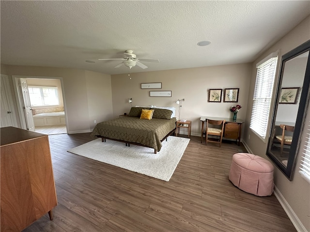 178 Foxchase Dr, North Strabane, PA 15317 - bedroom featuring a textured ceiling, wood finished floors, ceiling fan, and ensuite bath