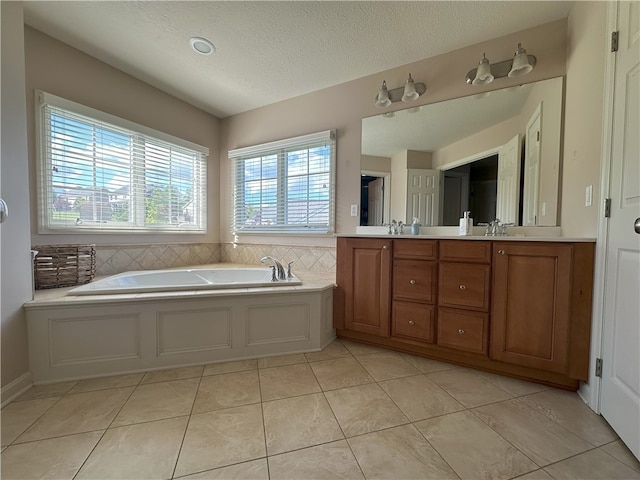178 Foxchase Dr, North Strabane, PA 15317 - bathroom with double vanity, a bath, tile patterned floors, and a textured ceiling