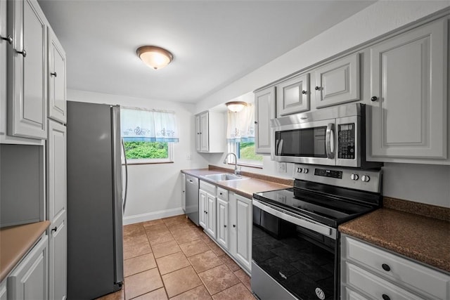 345 Franklin Dr, Peters Twp, PA 15241 - kitchen with appliances with stainless steel finishes and light tile patterned flooring