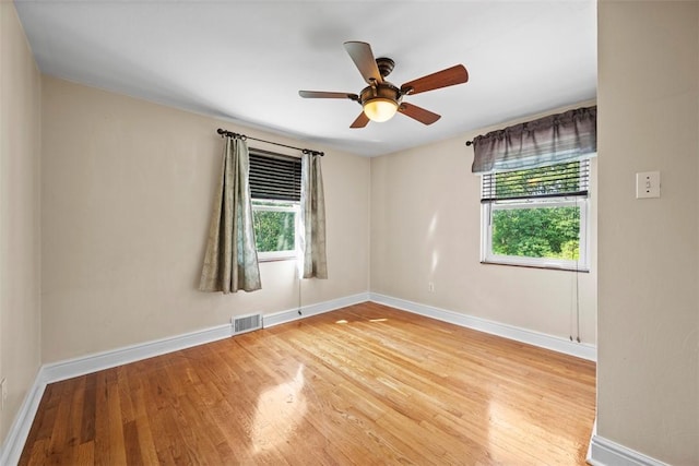 345 Franklin Dr, Peters Twp, PA 15241 - unfurnished room with healthy amount of natural light, wood finished floors, and ceiling fan