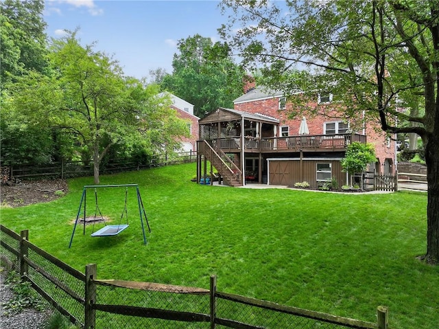 130 Kent Dr, Upper St Clair, PA 15241 - fenced backyard featuring stairs, a wooden deck, and a sunroom