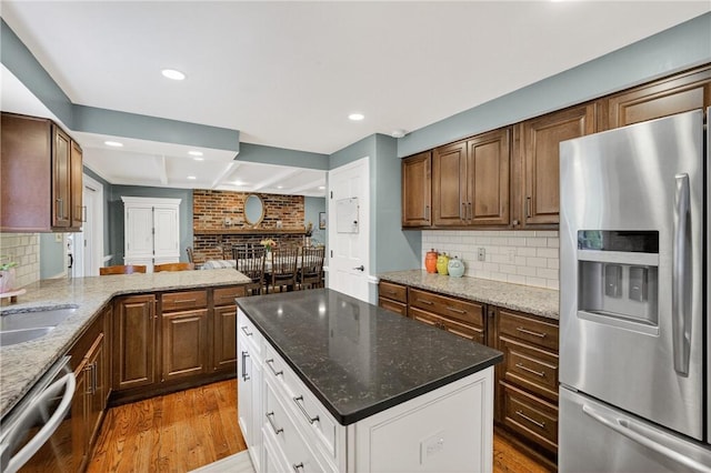 130 Kent Dr, Upper St Clair, PA 15241 - kitchen with appliances with stainless steel finishes, tasteful backsplash, recessed lighting, white cabinets, and wood finished floors