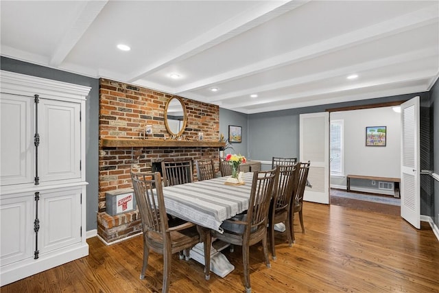 130 Kent Dr, Upper St Clair, PA 15241 - dining room with beam ceiling, wood finished floors, a brick fireplace, and recessed lighting