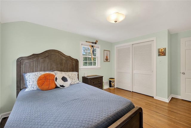 130 Kent Dr, Upper St Clair, PA 15241 - bedroom featuring wood finished floors and a closet
