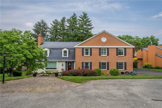 1061 Apple Hill Ln, Mccandless, PA 15101 - view of front facade featuring a chimney and driveway