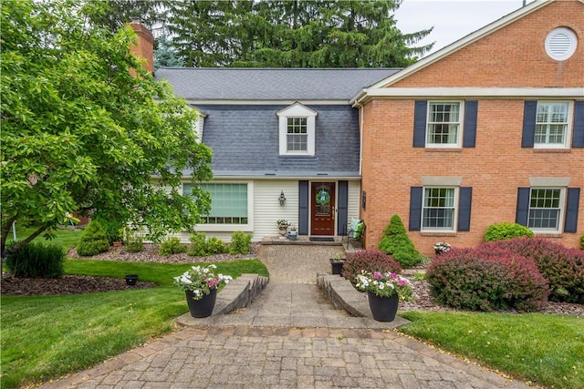 1061 Apple Hill Ln, Mccandless, PA 15101 - view of front of home featuring roof with shingles, a chimney, and a front yard