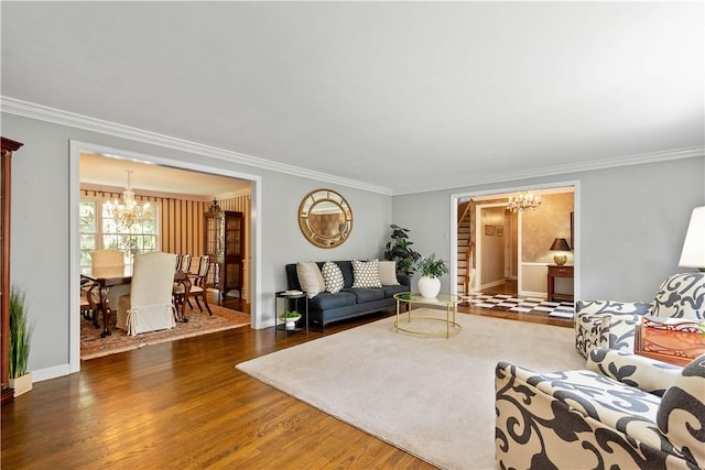 1061 Apple Hill Ln, Mccandless, PA 15101 - living room featuring a chandelier, wood finished floors, and ornamental molding